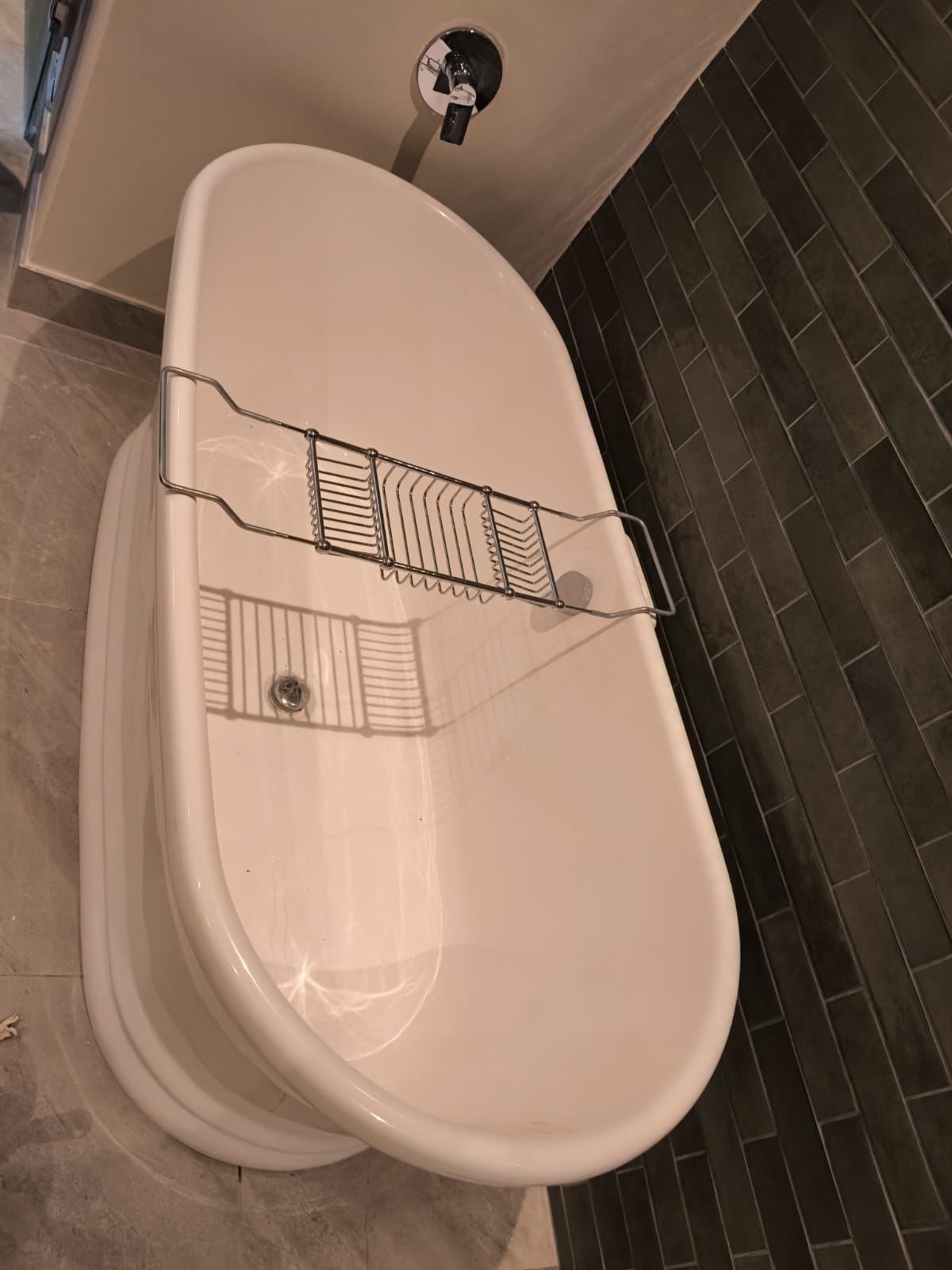 Gleaming freestanding bathtub