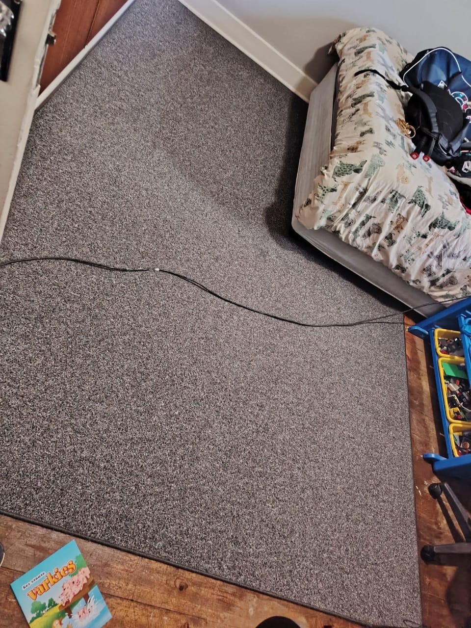 Clean grey carpet in a child's bedroom